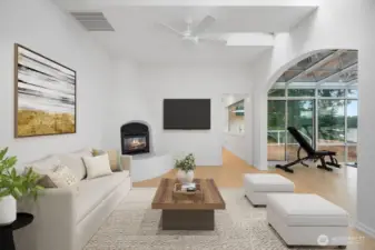 Cozy gathering area off of kitchen with gas fireplace