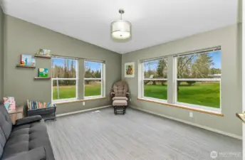 Family room with a nice view of the property.