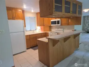 Display window cabinets above the bar