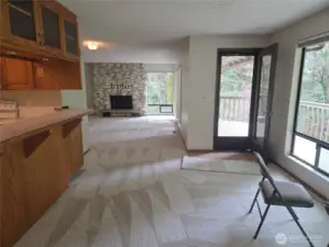 Door to the deck, and view into the living room