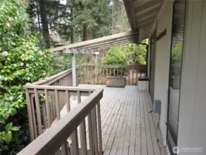 This Covered part of the deck off the primary had a hot tub at one time, its the perfect place to add one.