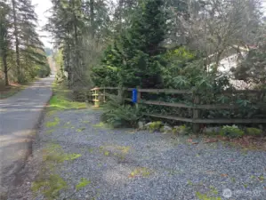 There is a seperate driveway to the barn and garage at the bottom of the hill