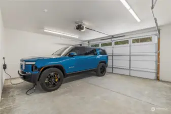 "Right Sized" 22' wide 2-Car Garage features a 240v EV charging outlet.