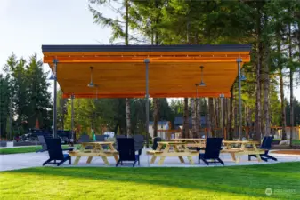 Generous outdoor gathering spaces encourage residents to meet, play and relax! This pavillion features gas BBQ taps, electrical outlets and lighting.