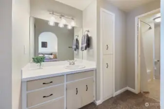 Primary side of the bathroom, which includes built-in storage.