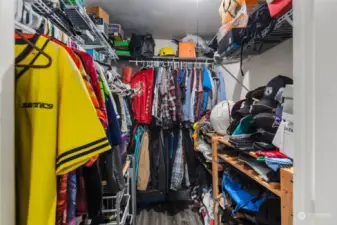 Additional walk-in closet set-up in the attached garage.