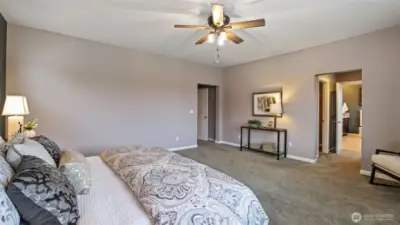 A secondary view of the primary bedroom shows just how large and spacious it is.