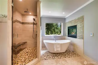 This is a bathroom you will never want to leave! Custom stand alone tub and a huge shower create a spa-inspired atmosphere.
