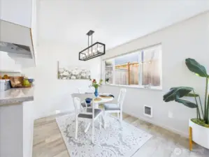 The main floor has laminate flooring throughout.