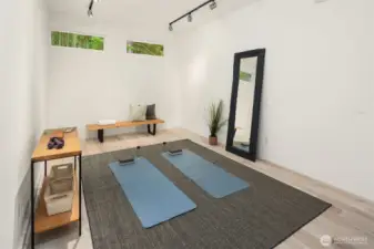Converted from a 3-car garage, this insulated flex room includes heat and AC, offering versatile space that can be adapted as desired.