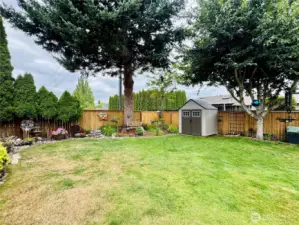 Several storage sheds stay with the home.