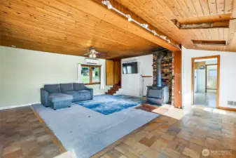 Large windows with natural light and gorgeous cedar plank ceilings
