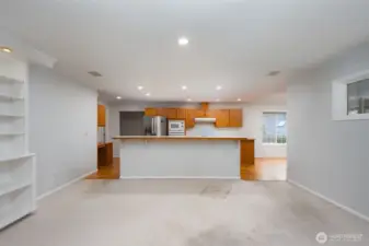 Great room concept with counter with bar space