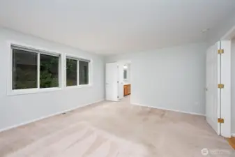 Primary bedroom has a nice private back yard view.