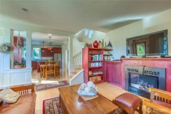 The main level is a great room connecting each space, but with intentional separation created by custom mill work..