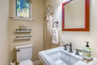 A powder room is conveniently located on the main level. Each level has a bathroom.