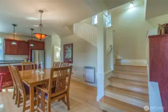 Stairs lead up to the second level with custom craftsmen millwork.