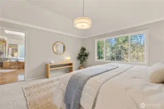 Primary bedroom with an ensuite bathroom