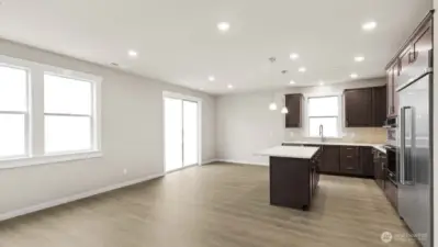 Gorgeous kitchen with plenty of storage and counter space to prep your meals or host a dinner party!  48" counter depth side by side built in refrigerator, gas cooktop and built in micro/oven.