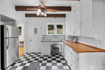 The kitchen offers plenty of space to modernize yet still keep with the design of the era.