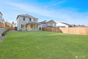 Enjoy the spacious backyard! *grass is enhanced*