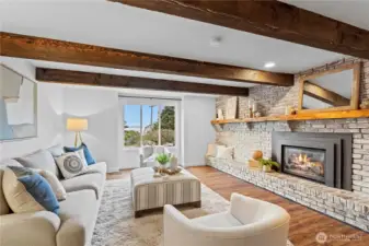 This warm and inviting space off the kitchen just welcomes you to settle in and relax.  Cool nights never felt so embracing!