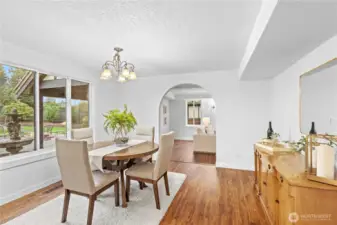 Overlooking the outdoor fountain, this dining room is a dream
