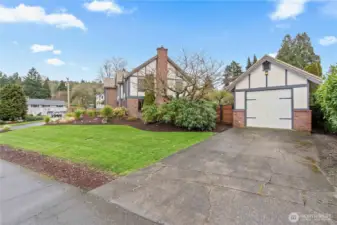 The secondary garage, lovingly referred to as the "boat house", tucked into the back of this is also a shop!