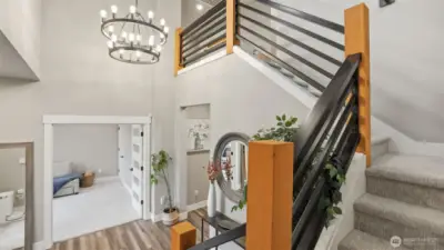 Trendy light fixtures including this modern chandelier.