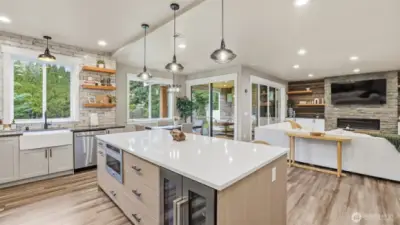 Don't miss the wine fridge and microwave in the oversized island.