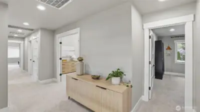 Large, open upstairs hallway.