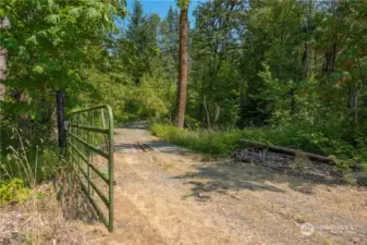 Through the gate will take you over the bridge and up the mountain.