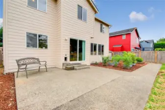 Extended patio plus garden areab& sidewalk around to the side