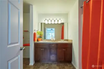 Double sinks and a built in linen closet space - room for all of your things!