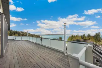 The deck runs the length of the house and has four access points.  Enjoy your morning coffee while taking in the views, relax in the evening and enjoy Camano Island’s famous sunsets.