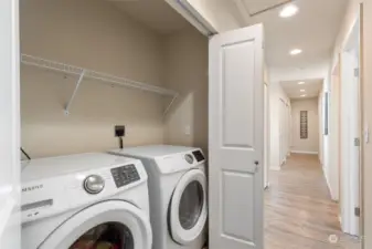 Tons of storage and convenient laundry center with ample storage