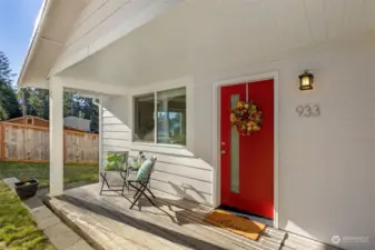 Delightful front porch perfect for holiday decorating and sunny mornings