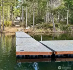 This gorgeous 60'x 28' dock was built in 2022.  The dock platform is 28'x12.5'. It is one of the largest docks in Mason County.