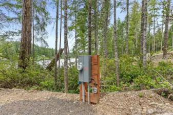 Future homesite electrical panel and water spiget.