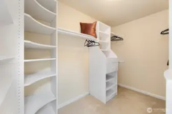 Walk in closet with custom built in organization