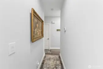 Hallway to 2nd bedroom and garage
