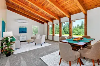 wood-framed vaulted ceilings in spacious living room
