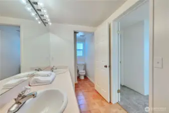 Downstairs bathroom with double sinks