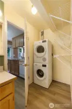 The washer and dryer stay. Plus check out that extra storage space!