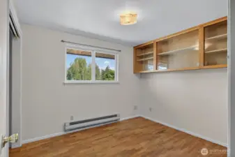 Guest bedroom #2 also has built in cabinets