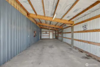 Attached to shop is a 16’x48’ lean-to