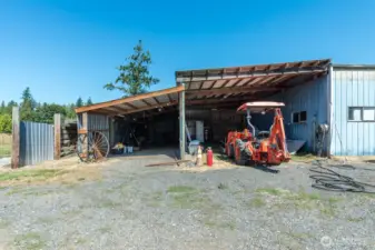 Attached to shop is a tractor 15’x32’