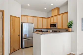 Spacious pantry to the left of the fridge