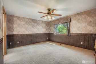 Generous primary suite with a great private view out of the window.