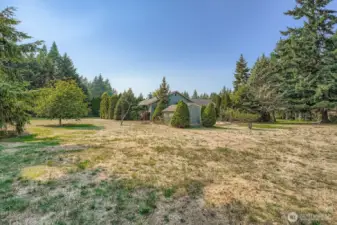 This property is one level acre but feels like it is so much more. So many things you can do with this!